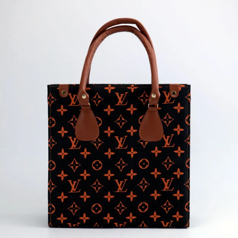 OnTheGo Monogram Canvas Handbag